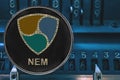 Coin cryptocurrency NEM XEM against the numbers of the arithmometer. Royalty Free Stock Photo