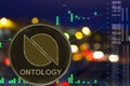 Coin cryptocurrency Ontology ONT on night city background and chart. Royalty Free Stock Photo