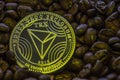 Coin cryptocurrency Tron is on the coffee beans.