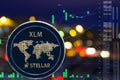 Coin cryptocurrency XLM on night city background and chart