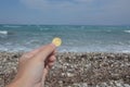 Coin in denomination of 50 euro cents on the Aegean coast on the island of Rhodes in Greece Royalty Free Stock Photo