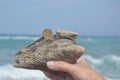 Coin in denomination of 50 euro cents on the Aegean coast on the island of Rhodes in Greece Royalty Free Stock Photo