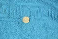 Coin in denomination of 50 euro cents on the Aegean coast on the island of Rhodes in Greece Royalty Free Stock Photo