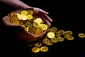 Coin gold in lady hand on lots stacking golden coins in broken jar white background, Money stack for business planning investment Royalty Free Stock Photo