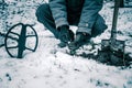 The coin is a lucky find when looking for treasures with metal detector in meadow