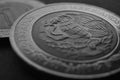 Coin of 5 Mexican pesos close up. Peso of Mexico. Reverse of coin with coat of arms of country. Eagle and snake. Dark black and Royalty Free Stock Photo