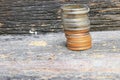 Coin money stacks on wooden floor background Royalty Free Stock Photo