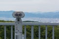 Coin Operated Binocular viewer looking out to Landscape with beautiful nature. Royalty Free Stock Photo
