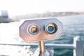 Coin Operated Binocular viewer next to the waterside promenade in Istanbul, Turkey looking out to Bosphorus Strait and city. Focus
