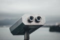 Coin operated binocular on the viewing platform in Antalya with blurred city and coast background. Royalty Free Stock Photo