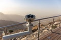 Coin operated binoculars at Jebel Jais Viewing Deck Park overlooking Hajar Mountains, UAE