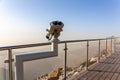 Coin operated binoculars at Jebel Jais Viewing Deck Park overlooking Hajar Mountains, UAE