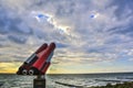 Coin operated binoculars to watch a dramatic sky over the Baltic Sea Royalty Free Stock Photo