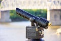 Coin-operated binoculars in view of Cincinnati on the Ohio River, with bridge in backgrouond Royalty Free Stock Photo