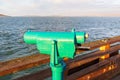 Coin operated monocular telescope for distant viewing on the pier