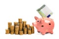 Coin piggy bank with EURO bill Royalty Free Stock Photo