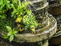 Coin thrown into wishing well at fountain at bolsover castle near chesterfield Royalty Free Stock Photo