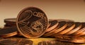 Coin of two euro cents in the background of coins. Royalty Free Stock Photo