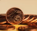Coin worth two cents is on coins. Euro money. Royalty Free Stock Photo