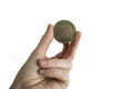 Coin Yes in a palm on a white background