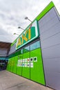 Entrance of the AKI store in Barreiro Planet Retail Park.