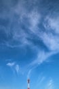 The coincidence of the clouds appeared as if they were rising from the transmission tower.