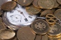 Coins and Antique pocket watch Royalty Free Stock Photo