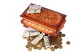 Coins and banknotes in the box Royalty Free Stock Photo