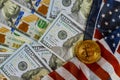 Bitcoin coins on American flag background with US dollars