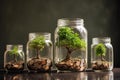 Coins in a bottle and the green tree, Represents the financial growth. The more money you save. Royalty Free Stock Photo