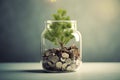 Coins in a bottle and the green tree, Represents the financial growth. The more money you save. Royalty Free Stock Photo