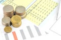 Coins with business graph Royalty Free Stock Photo