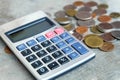 Coins and Calculator Royalty Free Stock Photo