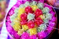 Coins in colorful ribbin in a gold bowl for Newly ordained Buddhist Royalty Free Stock Photo