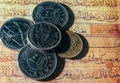 Coins of dinars, Kuwait national currency and lines from the Quran