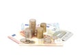 Coins and euro bills isolated in white Royalty Free Stock Photo