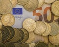 Coins euro cents are on a paper bill of fifty euros. Euro money Royalty Free Stock Photo