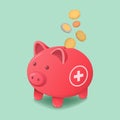 Coins falling inside a piggy bank: emergency fund Royalty Free Stock Photo