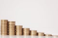 Coins in the form of a histogram on a white background. Concept of lending, savings, insurance