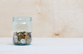 Coins in a glass jar Royalty Free Stock Photo