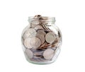 Coins in glass jar isolated on white background with clipping path, Business finance saving money banking investment concept Royalty Free Stock Photo