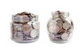 Coins in glass jar isolated on white background with clipping path, Business finance saving money banking investment concept Royalty Free Stock Photo