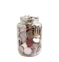 Coins in glass jar isolated on white background with clipping path, Business finance saving money banking investment concept Royalty Free Stock Photo