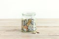 Coins in jar Royalty Free Stock Photo