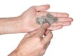 Coins in hands. Hand holding coins. Ukrainian money