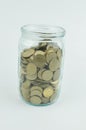 coins on an isolated background. Saving money, accumulating for the realization of a dream