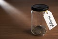 Coins in a jam jar Royalty Free Stock Photo