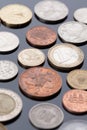 Coins lying on a black surface Royalty Free Stock Photo