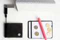 Coins on notebook and RFID protected wallets Royalty Free Stock Photo