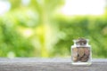 Coins in a piggy bank bottle. Finance and Money concept, Hope of Royalty Free Stock Photo